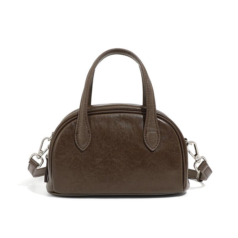 Женская сумка-боулинг Boston Bowling Bag из натуральной кожи растительного дубления Niche с одним плечом и через плечо