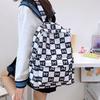 Рюкзак в клетку черно-белого цвета в стиле InS имеет большую вместимость и высокий уровень внешнего вида, который может выдержать плечи студентов.