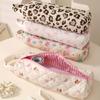 Bow-design hair tool storage bag with zipper. Dustproof for hair dryers and styling tools, ideal for travel and daily use.