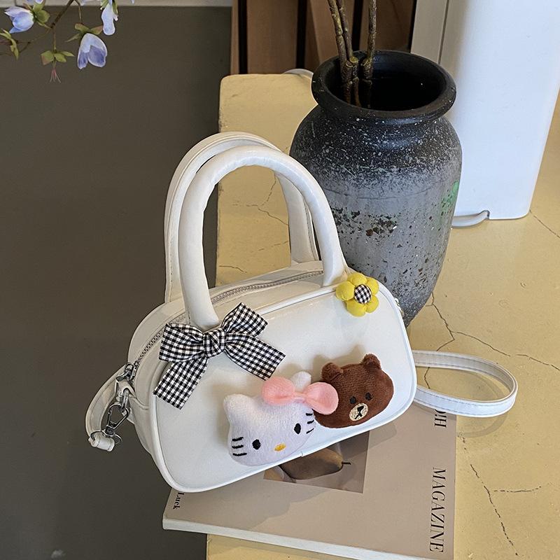 Korean Version of Cute Cartoon Doll Handbag Women's Bag 2025 Fashion Versatile Hand Small Square Bag Simple Shoulder Messenger Bag