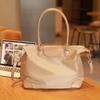 Simple Casual Women's Dumpling Handbag: High-End, Large Capacity, Crossbody & Commute Bag