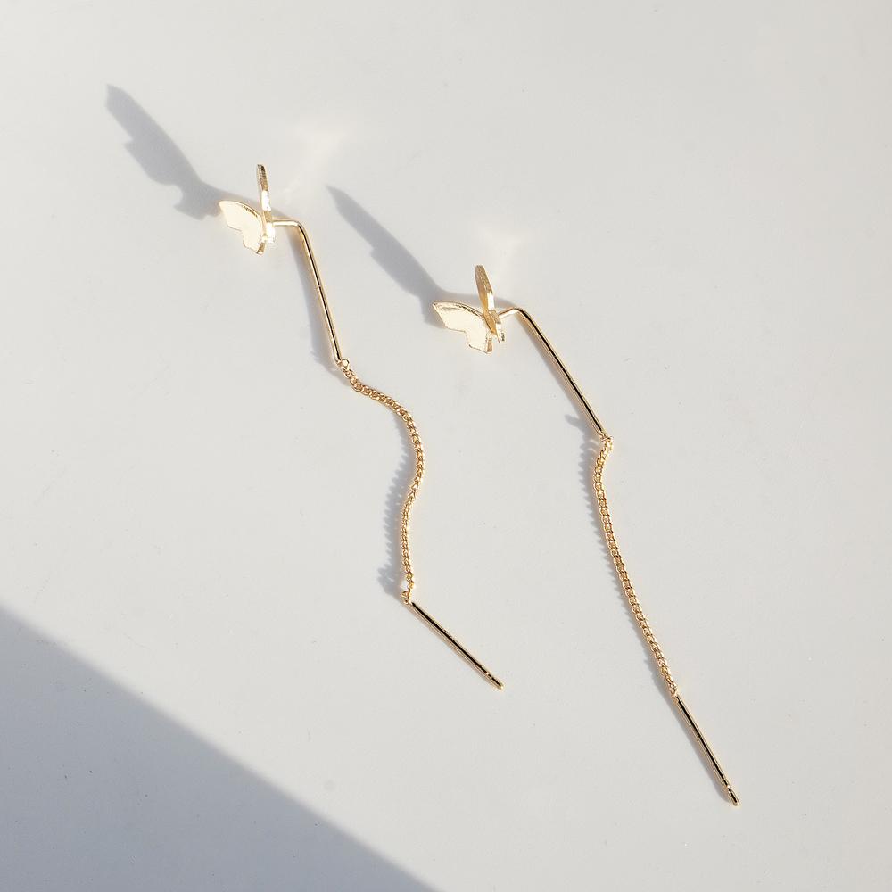 Женские серьги-бабочки универсальны, молоды и элегантны. Модные серьги с подвесками.