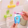 1 Pc Rolling Squeezer Toothpaste Dispenser Tube Sucker Hanging Holder ADM