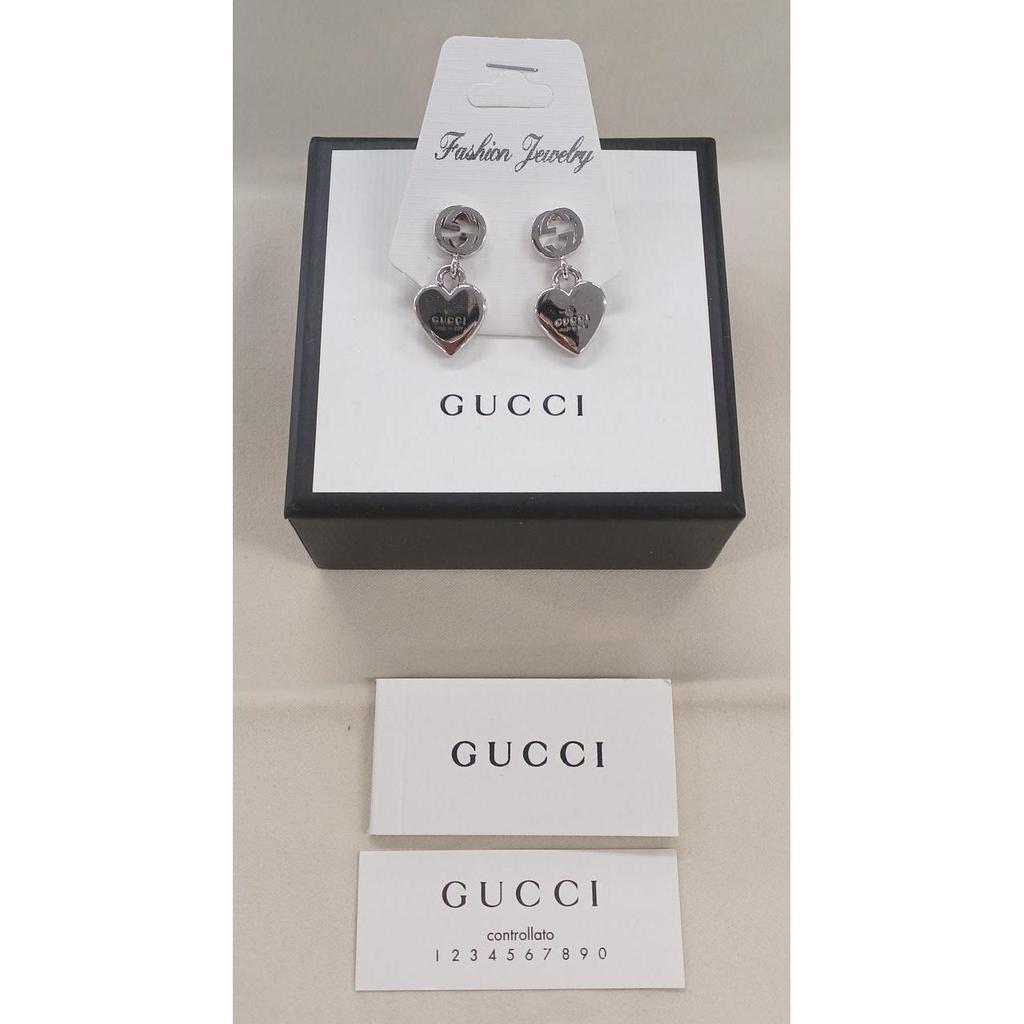 Б/у серьги GUCCI в форме сердца с логотипом GG