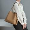 Niche New Женская сумка Crossbody Bag Универсальная кожаная сумка-ведро на одно плечо Большая вместимость для поездок на работу