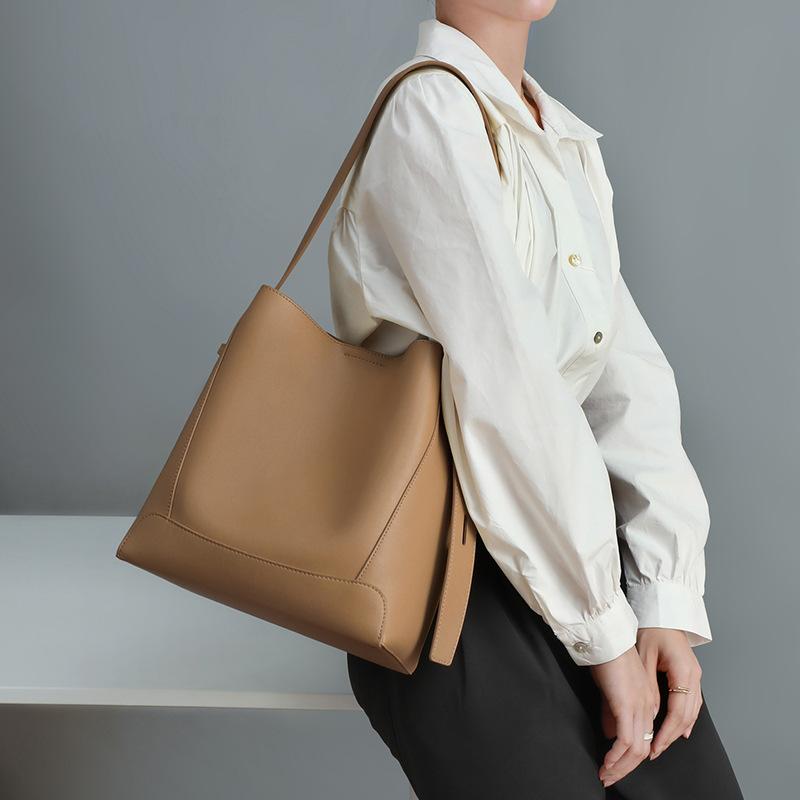 Niche New Женская сумка Crossbody Bag Универсальная кожаная сумка-ведро на одно плечо Большая вместимость для поездок на работу