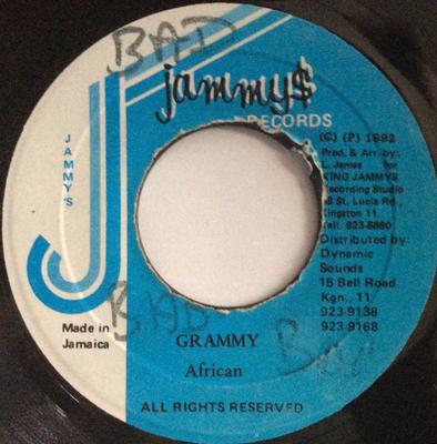 7-дюймовая пластинка АФРИКАНСКИЙ - Грэмми НИКАКОЙ Jammy's Records 1992 Ямайка Регги, Ска и Даб Б/У