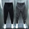 Men Casual Pants Elastic Waist Button Fly Long Pants Pockets Solid Color Fastener Tape