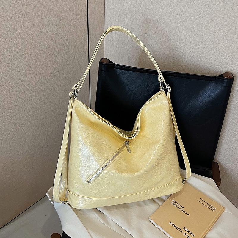 Retro large-capacity commuting 2026 spring new casual messenger one shoulder back double shoulder tote bag women