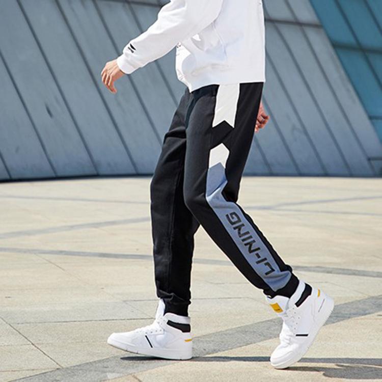 Спортивные брюки Li Ning мужские Синий цвет Flint Stones Умеренная посадка AKLP847-7