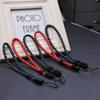 Регулируемый нейлоновый ремешок для телефона, USB-накопителя, рации, наручного Bluetooth-динамика, саундбара и веревка от потери.