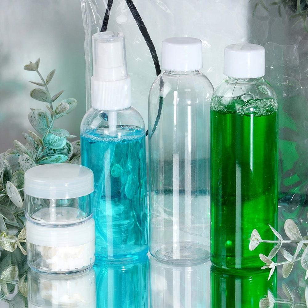 Bottles travel containers for cosmetics for the plane with a 5-piece cosmetics bag.