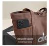Versatile Large Capacity Canvas Tote: Fashionable Shoulder or Handheld School Bag for Commuting and Shopping