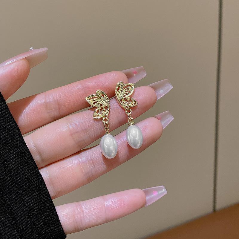 Silver Needle Hollow Butterfly Pearl Earrings Women's Unique Niche Design Earrings Light Luxury High-end Earrings
