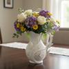 Modern white butterfly vase for flowers, elegant design