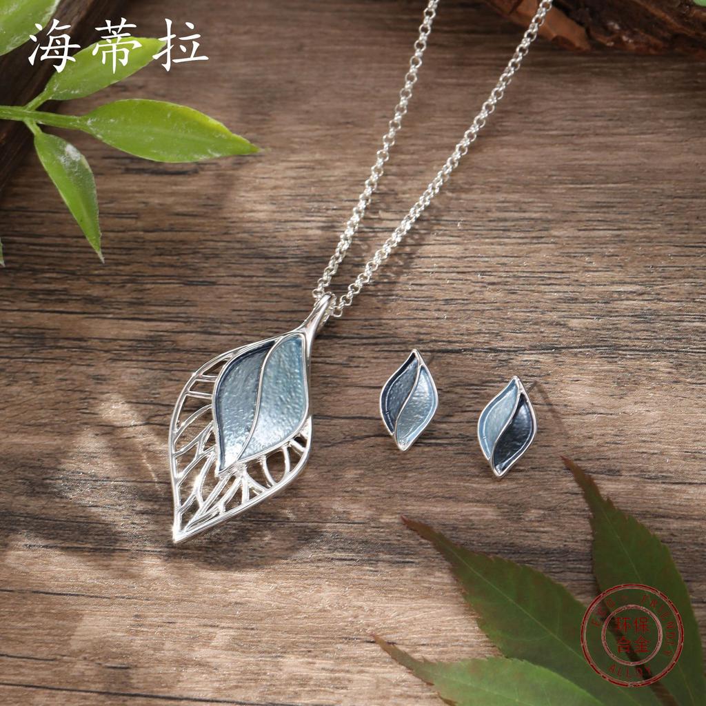Luxury new color painting oil hollow leaf stud earrings pendant set, women's simple versatile leaf necklace