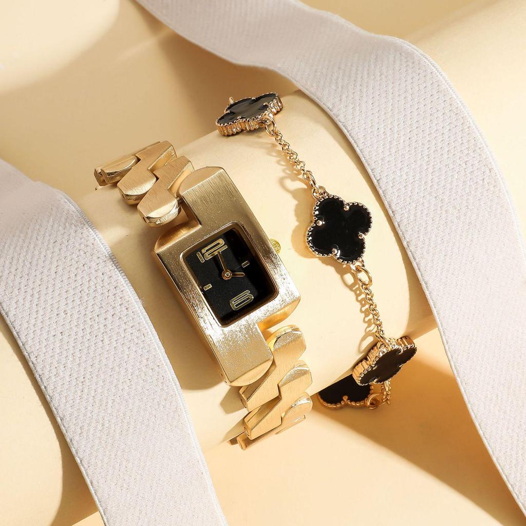 Женские кварцевые часы и браслет с четырехлистным клевером