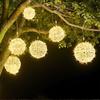 Solar-Powered LED Rattan Ball String Lights - Waterproof Outdoor Hanging Lights for Courtyard Trees and Landscape Atmosphere.