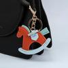 TikTok Trendy Leather Horse Keychain Pendant - Cartoon Rocking Horse Bag Charm