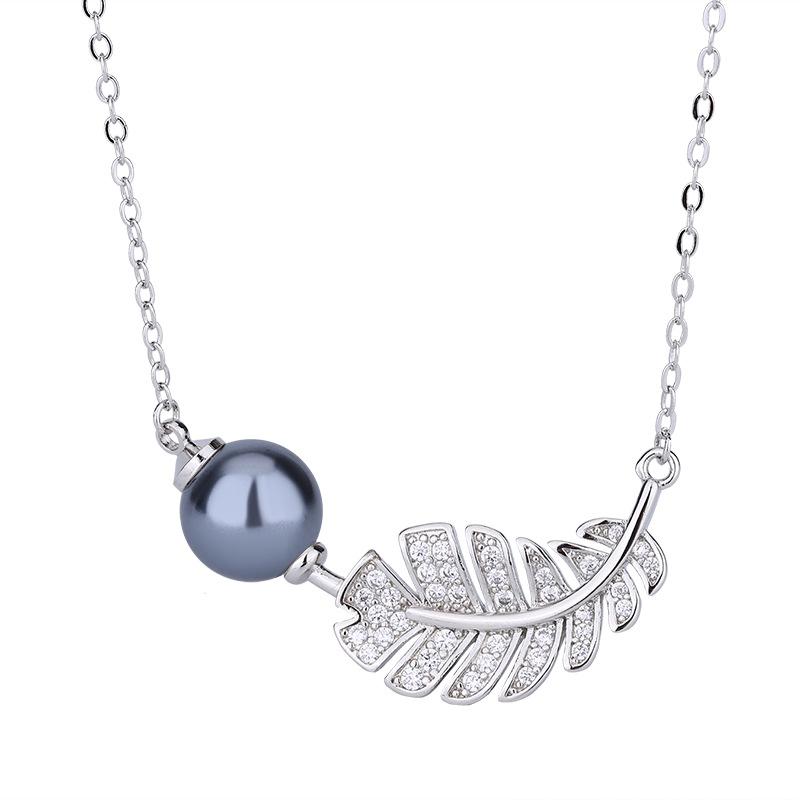 Imitation natural freshwater pearl feather ring European and American S111 silver needle earrings zircon Tahiti necklace women's