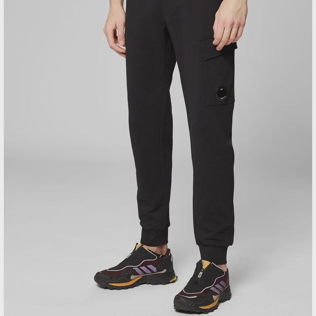 Спортивные брюки унисекс в функциональном стиле с несколькими карманами — в европейском и американском стиле