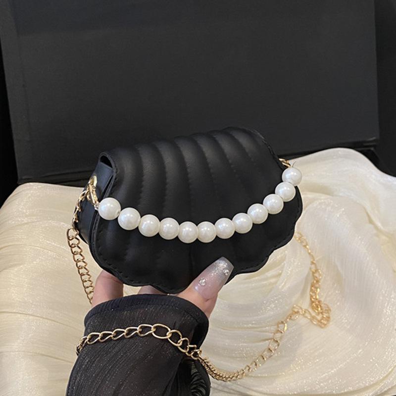 Нишевая сумка-ракушка 2025 лето новая сумка женская мода простая сумка через плечо повседневная сумка-мессенджер