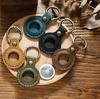 2025 Fashion Custom Top Layer Cow Leather Keychain Apple Air Tag Protective Cover Pet Anti-Loss Location Tracker Key Ring Sleeve