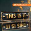2D Flat, 2D Flat - A Decorative Aluminum Wall Sign In a Vintage Style Measuring 10X40cm (3.9X15.991 Inches) That Reads 'THIS IS IT'. It's Suitable for