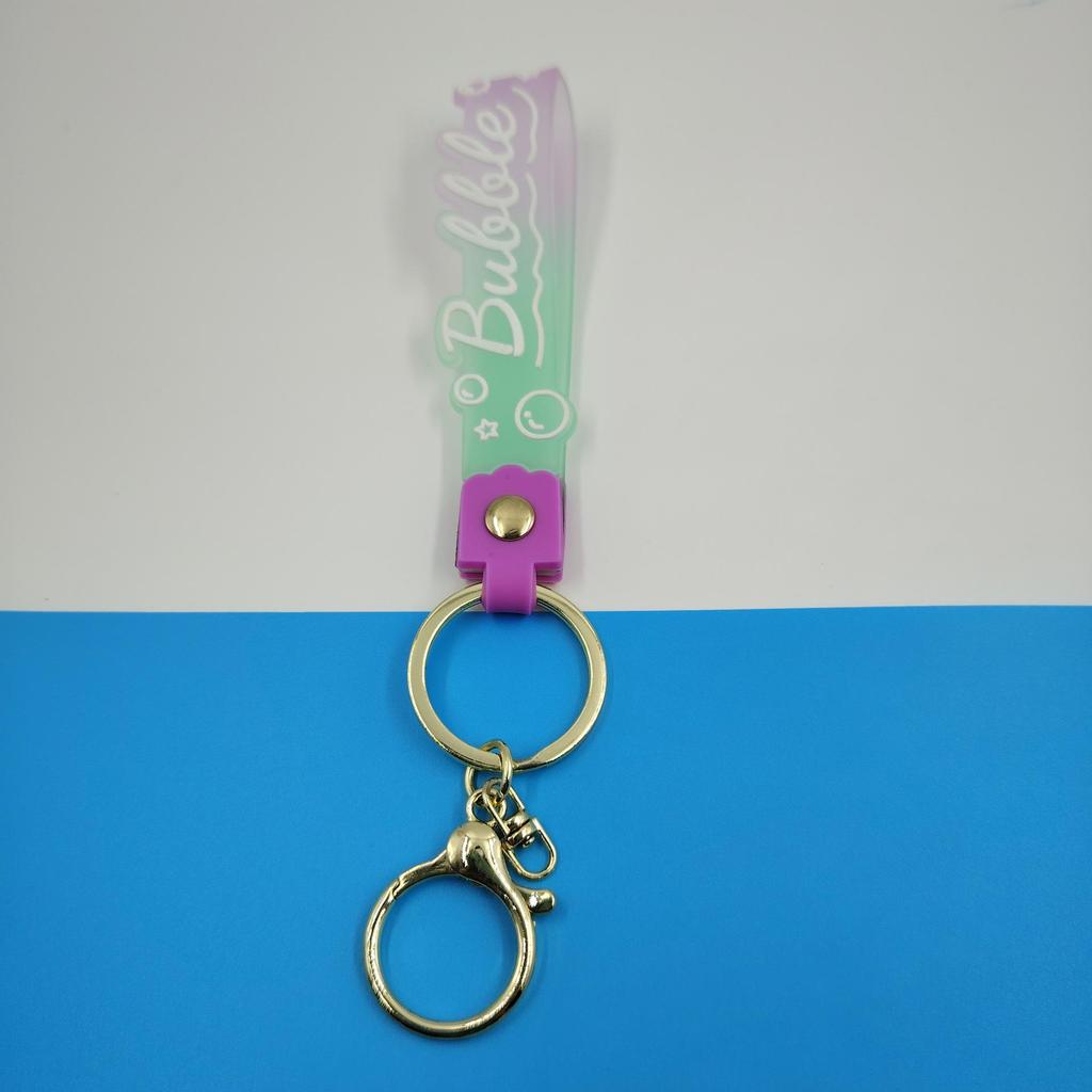 PVC Keychain with Leather Cord and Candy Soft Rubber Doll, Transparent Lanyard, and Jelly Gradient Color Hand Rope