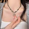 Retro Chinese Tassel Necklace: Unique Ethnic Style Women's High-End Clavicle Chain.