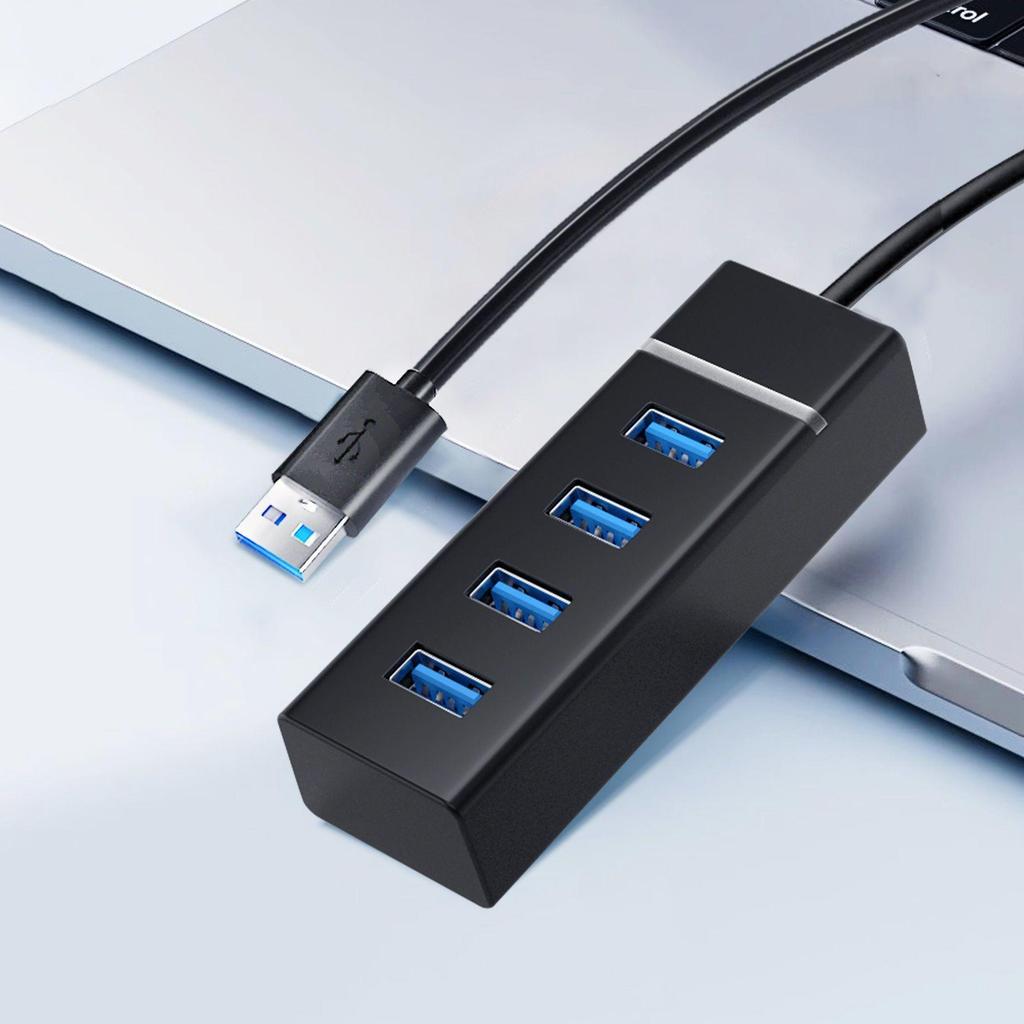 Высокоскоростной многопортовый USB 3.0 концентратор с вертикальным расширением для ноутбуков и настольных компьютеров.