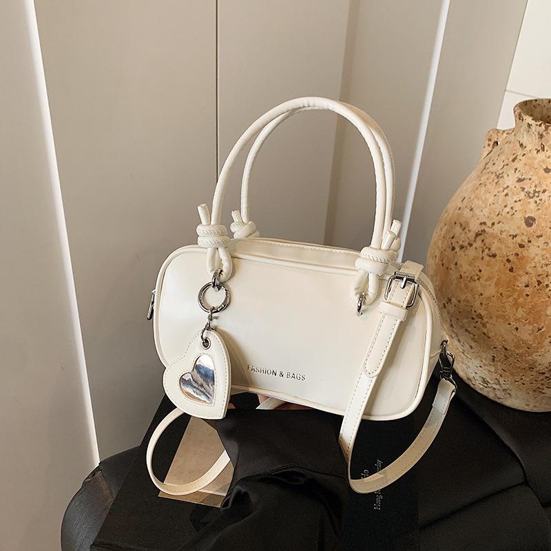 Ручная маленькая сумка женская летняя универсальная новая сумка-мессенджер на плечо для通勤, модная сумка-подушка