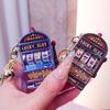 Light-Up Fruit Machine Spinner Keychain with Music and Magnet - Travel Souvenir Gift