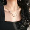 Vintage, high-quality, designer clavicle chain necklace featuring artificial crystal and pearl accents