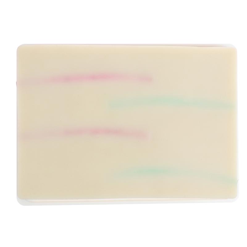 Модель для отработки навыков венепункции. Силиконовая учебная модель для наложения швов на кожу человека.