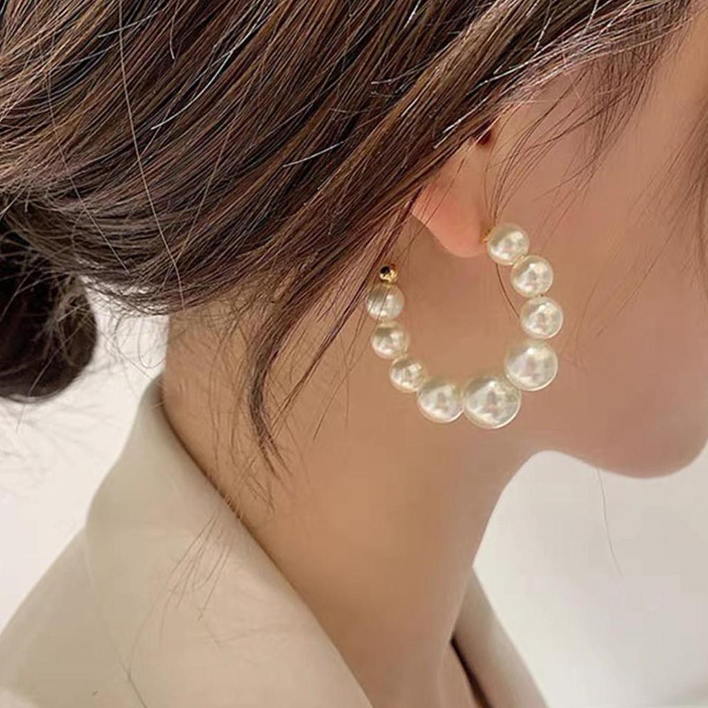 Серебряные серьги-кисточки с жемчугом и иглами - модные универсальные женские украшения