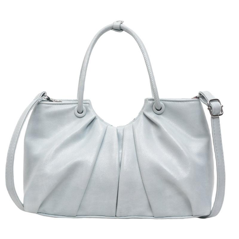 Корейская версия нишевой дизайнерской плиссированной сумки в иностранном стиле, женская универсальная сумка-мессенджер для通勤 из масляной вощеной кожи с чувством стиля