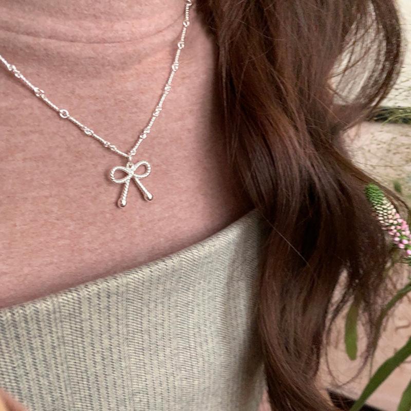 Милое и крутое ожерелье с бантом в виде спирали, женский нишевый дизайн, чувство легкости, роскошь, элегантность, индивидуальность, мода, цепочка на шею, цепочка на ключицу
