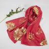 "Ethnic Silk Scarf: Gold-Stamped Red Desert Shawl for Women"