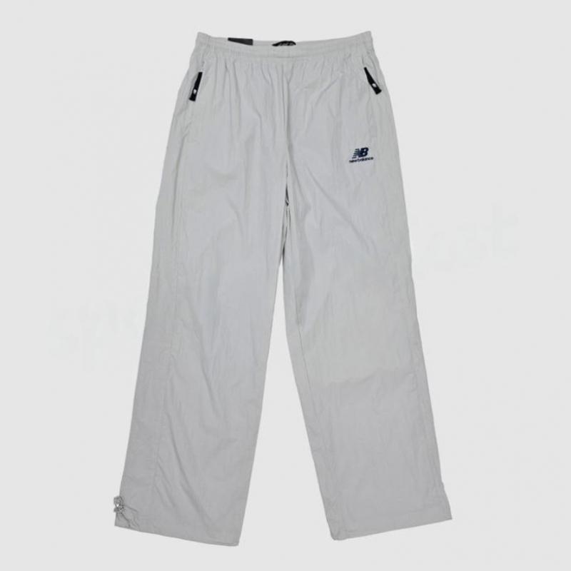 New Balance Унисекс Базовые нейлоновые брюки с логотипом Nbntc32703
