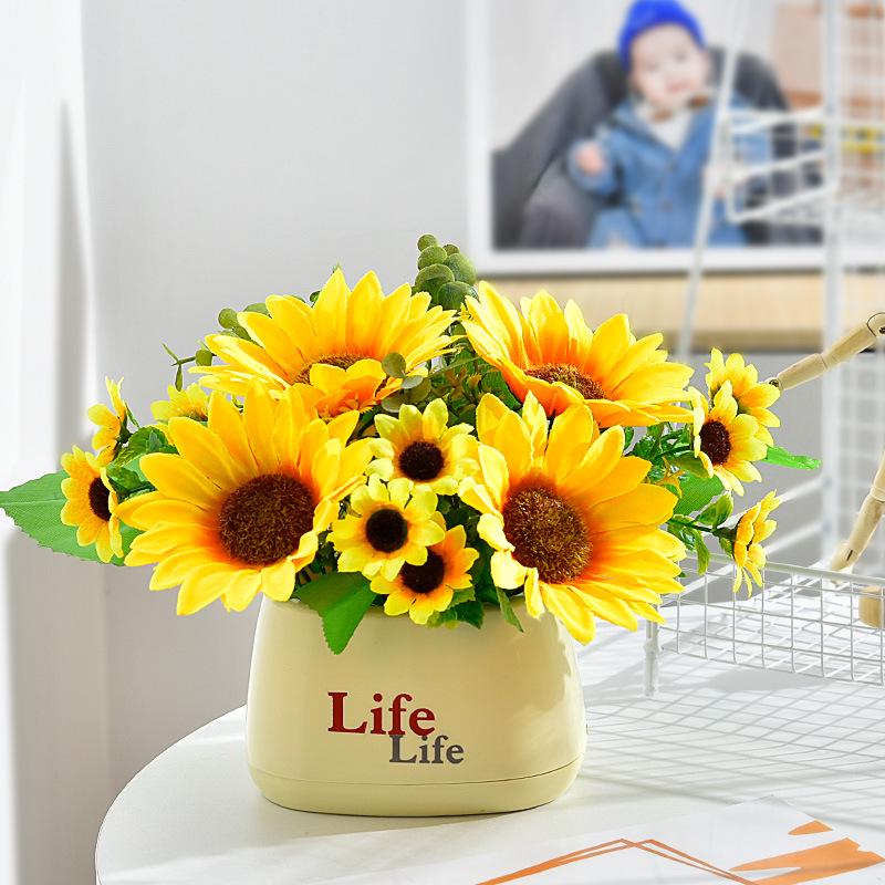 Living Room Decor: Artificial Sunflower and Green Plant Arrangements, Small Potted Plants, and Plastic Bouquets