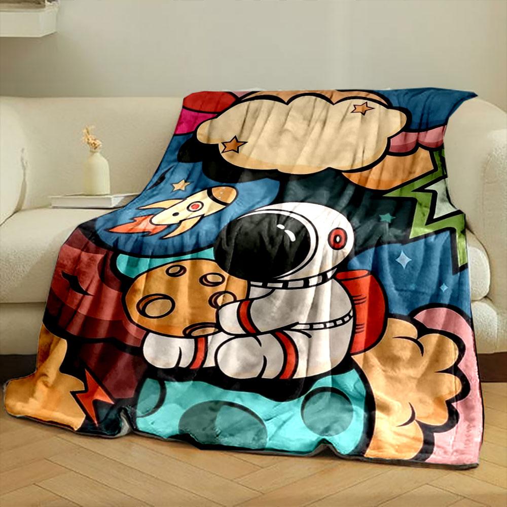 Astronaut on colorful planets with rocket, stars, and playful design. for all seasons blanket lunch break throw gift