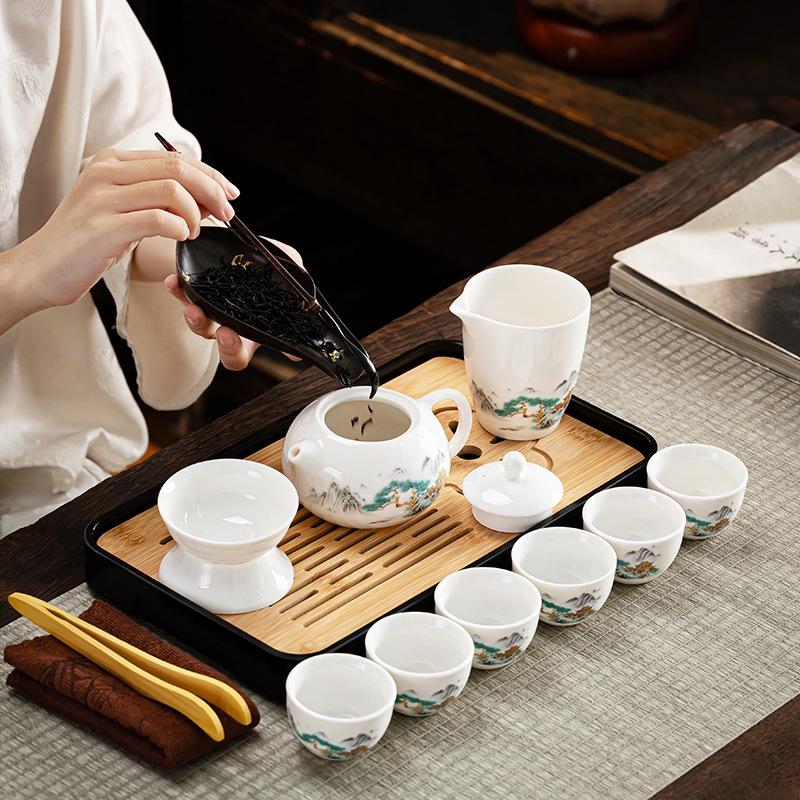 Suet jade white porcelain kung fu tea set rime pavilion set Chinese tea pot travel leather bag tea set business souvenir