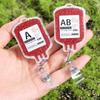 ABS Выдвижной бейдж-катушка Легко вытягиваемая пряжка Противопотерянный Форма капли крови Зажимы Держатель ID медсестры Брелок для ключей