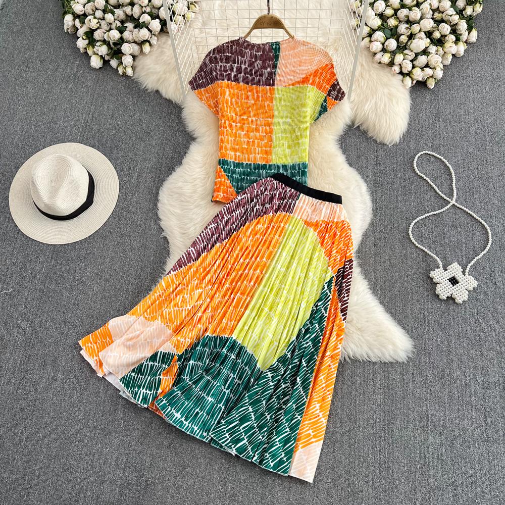 Женский модный комплект с круглым вырезом, тонкий короткий топ из двух частей, плиссированная юбка-трапеция с высокой талией и принтом