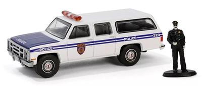 Greenlight Масштаб 1/64 GMC Suburban 2500 1985 NYPD + Полицейская фигурка Greenlight Suburban Полицейский автомобиль [Параллельный импорт]