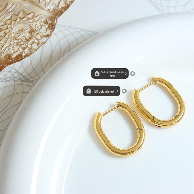 Геометрические серьги-подвески U-образной формы из титана с покрытием 18K золотом, осенняя коллекция