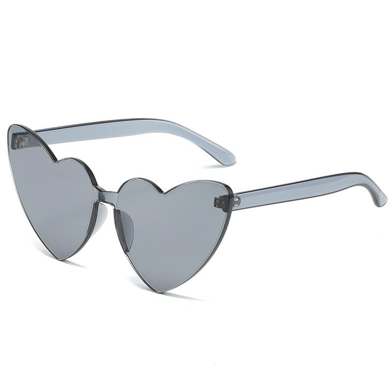 one-piece rimless peach heart glasses for women, retro love-shaped toad glasses for men, and color one-piece sunglasses.