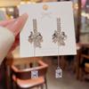 Bow Crystal Tassel Earrings Female Niche Design Advanced Sense Earrings New Cool Wind Explosion Earrings.