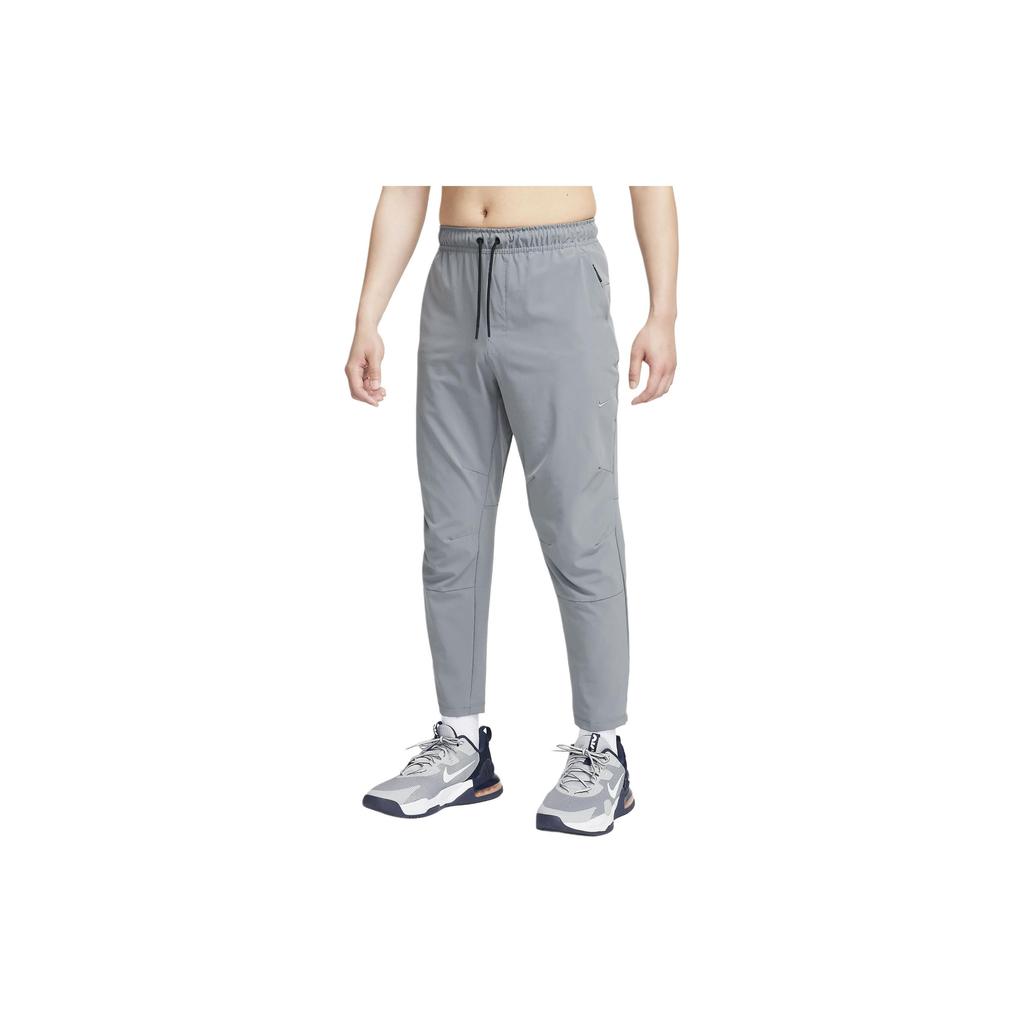 Nike Универсальные брюки прямого кроя Nike Dri-FIT Unlimited Азиатский размер Мужские Дымчато-серый Черный FB7547-084